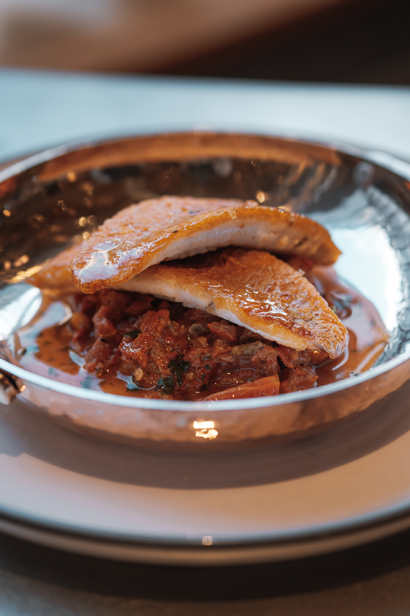Barboun’s signature red mullet on a bed of spicy muhammara