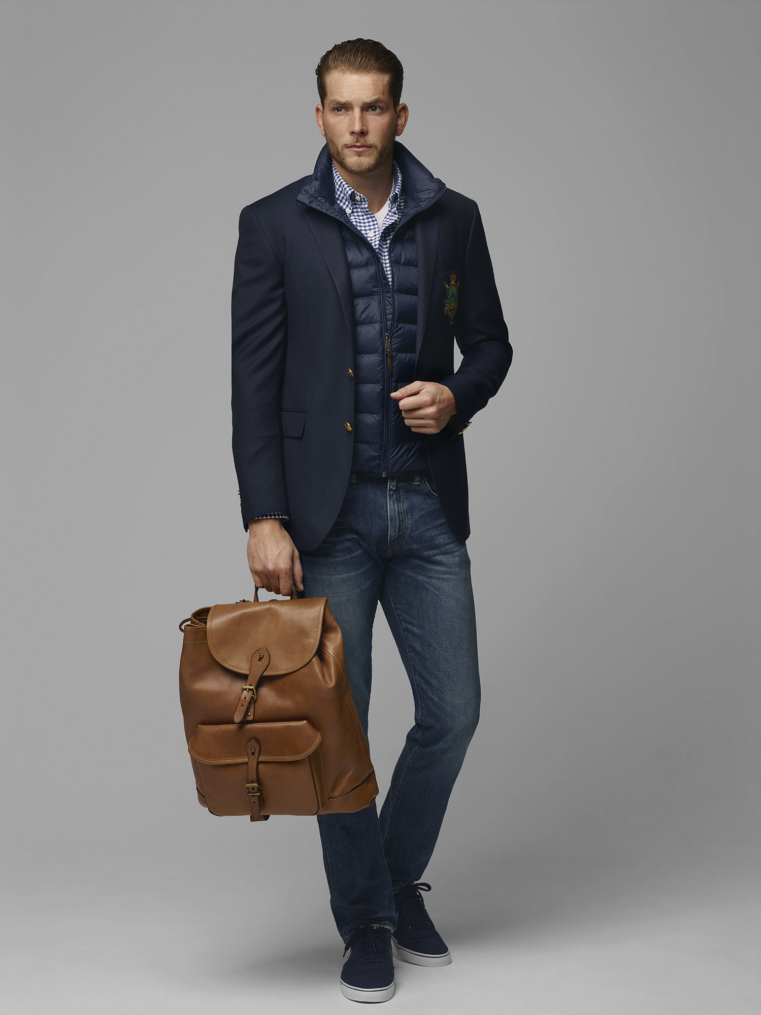 Blazer, £425; quilted gilet, £229; gingham shirt, £85; T-shirt, £55; jeans, £119; trainers, £69; leather backpack, £579