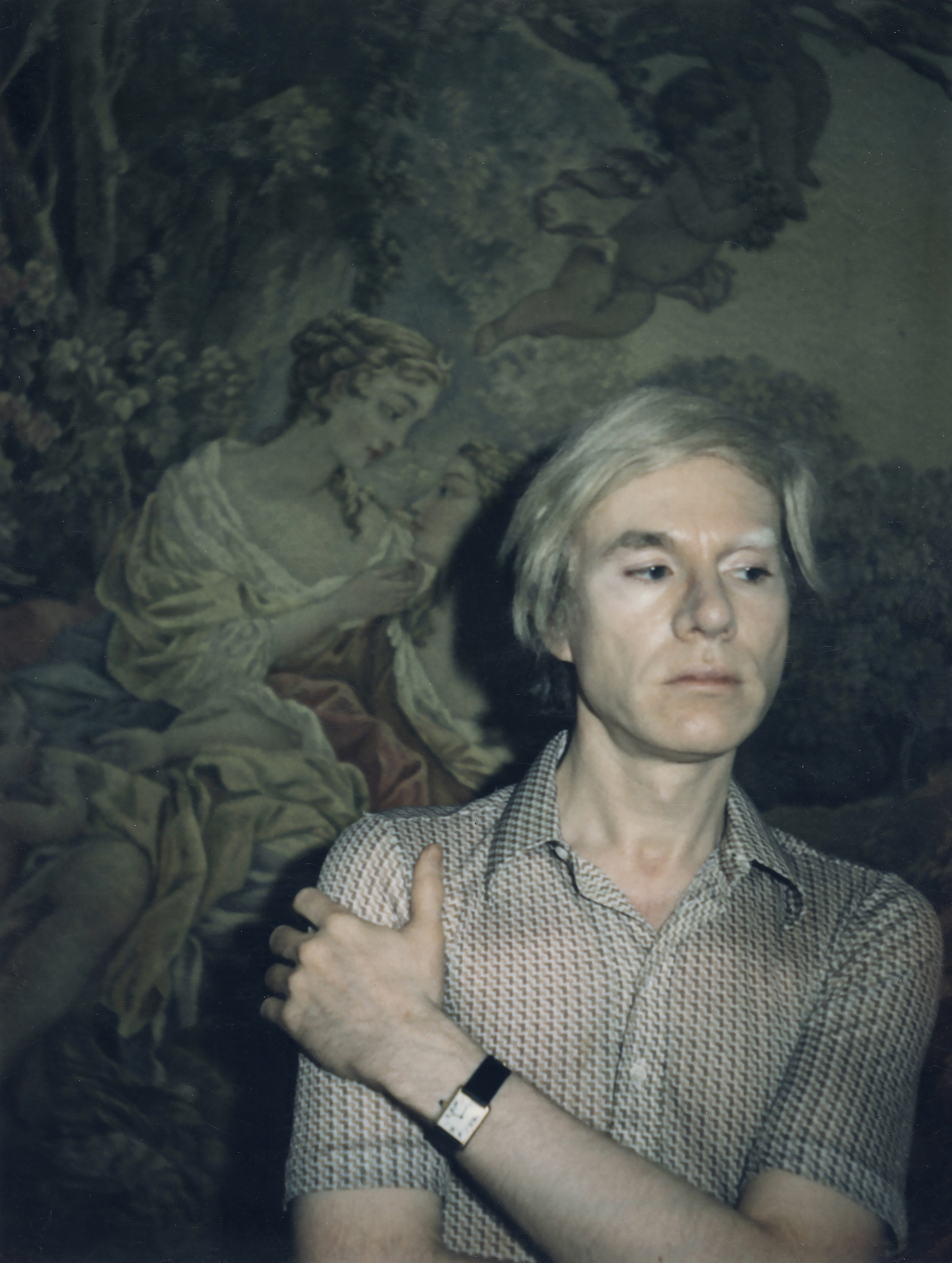 Andy Warhol wearing the Cartier Tank watch