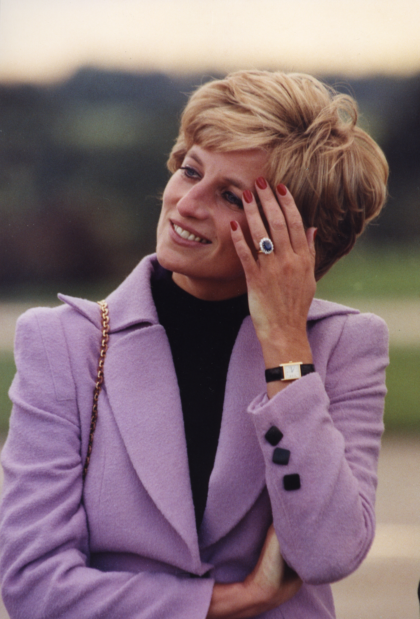 Lady Diana wearing her Cartier Tank watch