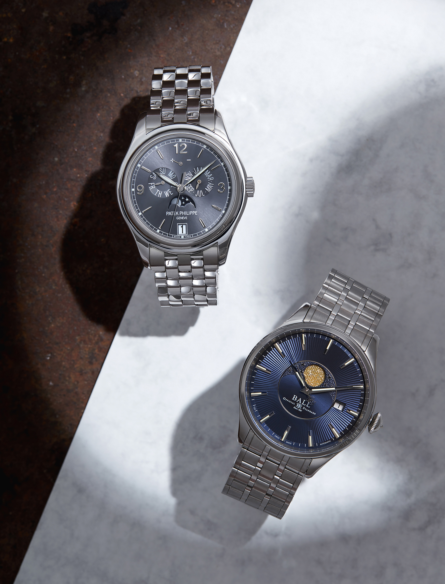 From left to right: Gentleman’s self-winding Annual Calendar bracelet in white gold with slate grey sunburst dial, £50,610, PATEK PHILIPPE; Trainmaster Moonphase, £1,750, BALL