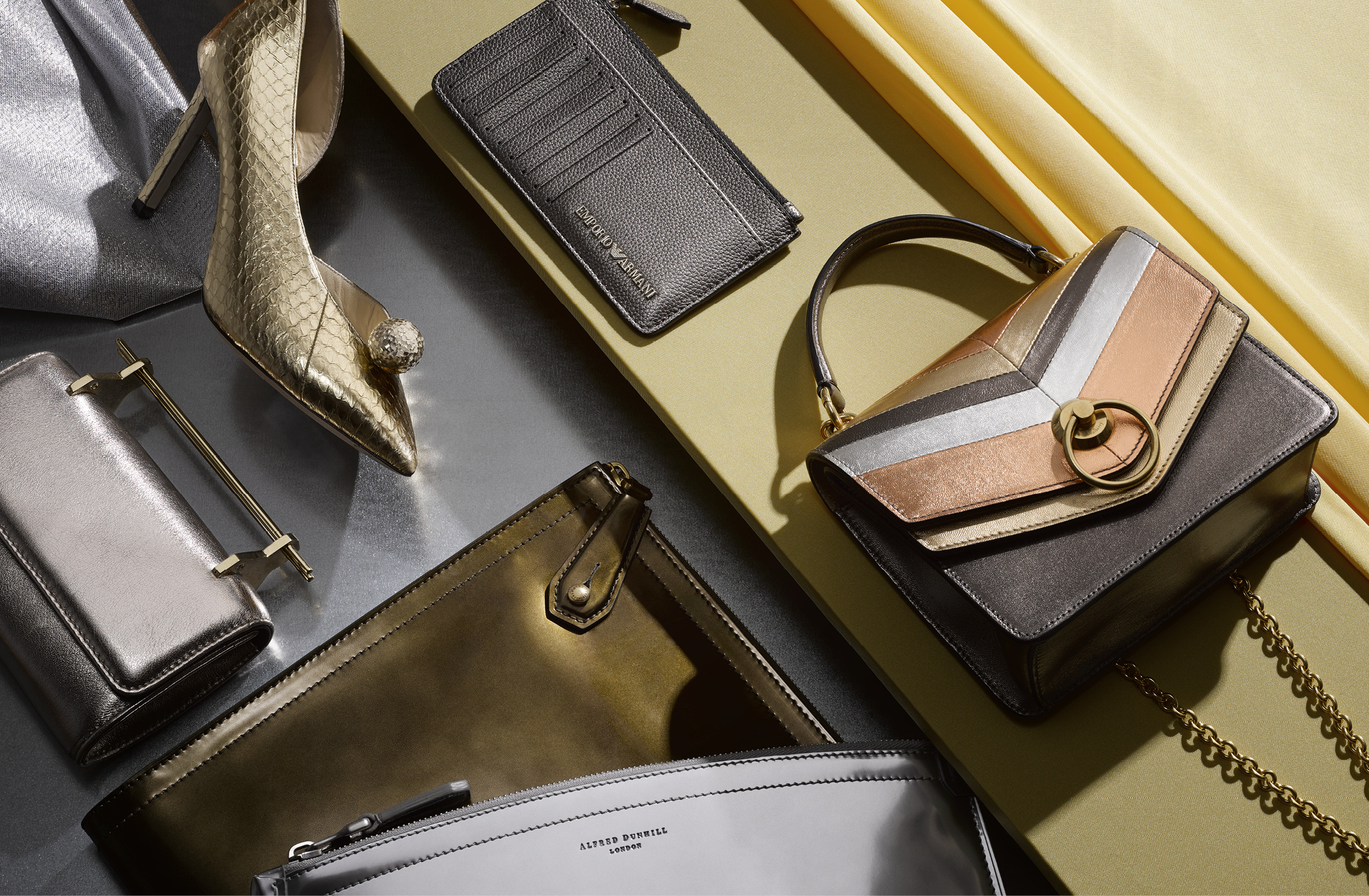 Clockwise from top left: Sadira 100 shoe, £850, JIMMY CHOO; card holder, £115, EMPORIO ARMANI; small satchel, £650, MULBERRY; brass folio, £775, and chrome folio, both DUNHILL; mini bag, £960, M2MALLETIER