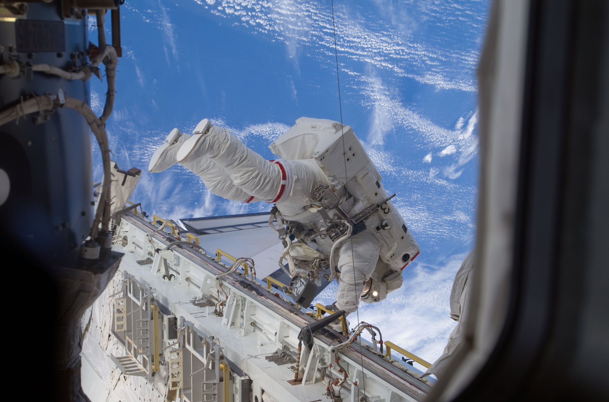 Astronaut Nicole Stott, Expedition 20 flight engineer, participates in the STS-128 mission's first session of extravehicular activity as construction and maintenance continue on the International Space Station. Image courtesy of NASA