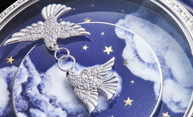 The dial of Chaumet’s Complication Créative Colombes features two diamond doves in place of hands, against an enamel blue sky. Every hour, the birds meet and join their rings together to form an 8, representing eternity. £POA, CHAUMET