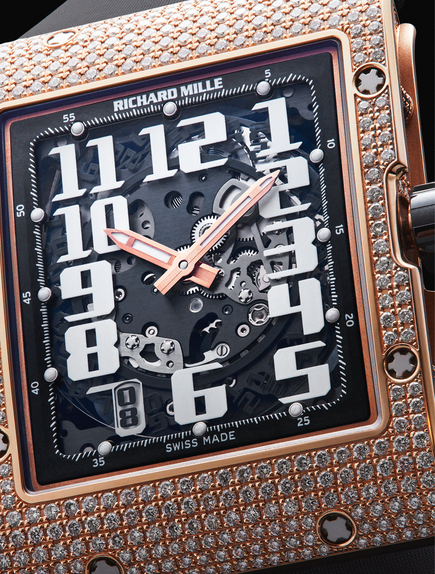 The Richard Mille RM016 Automatic Winding Extra Flat 18ct Red Gold model with diamonds allows the rewinding of the mainspring to be adapted most effectively to the user’s activity levels. £171,000, RICHARD MILLE