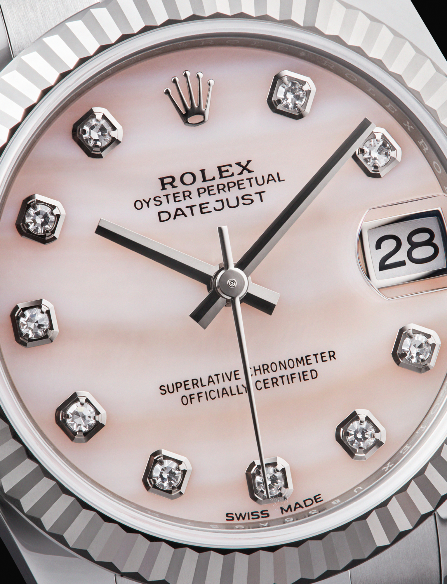 The iconic Rolex Datejust 31 is characterised by its oyster steel and white gold case and bracelet, and its pink mother-of- pearl dial featuring diamonds markers. It is powered by a calibre 2235 self-winding mechanical movement. £9,150,ROLEX