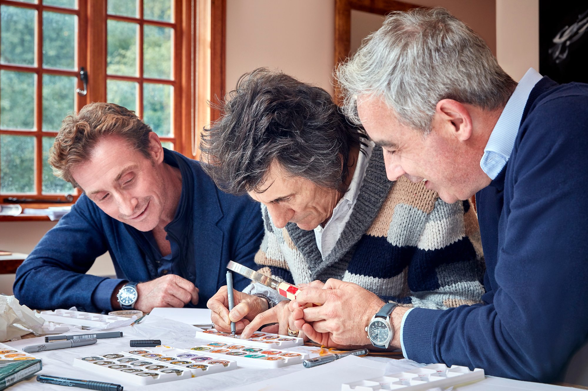 Ronnie Wood with Bremont Founders Nick and Giles English