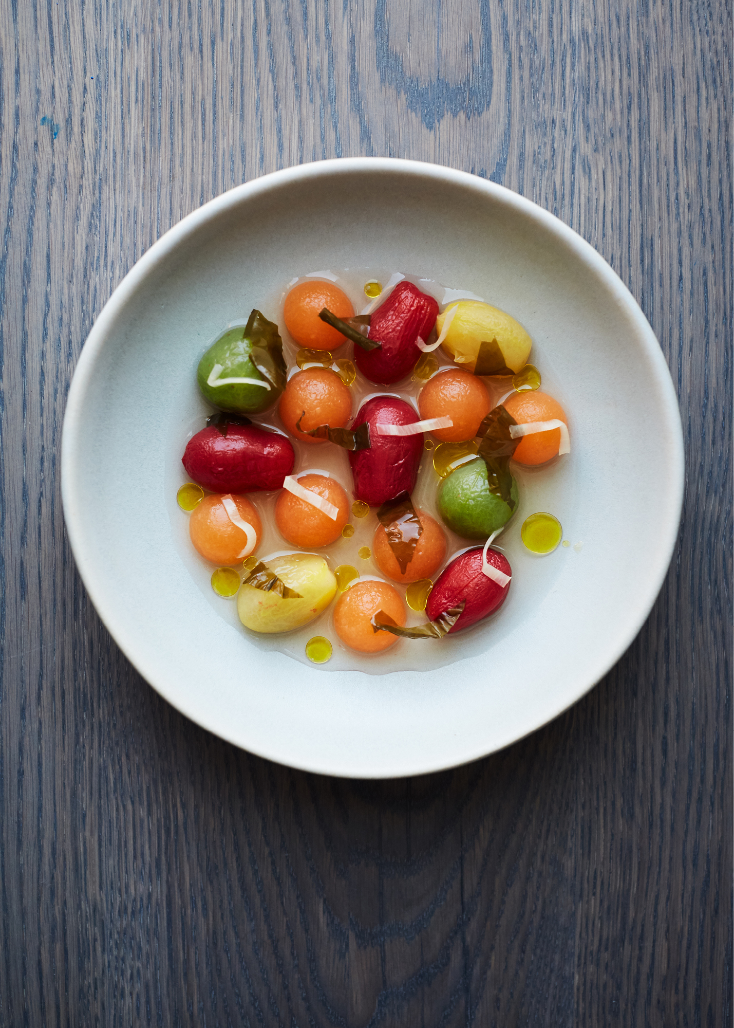 Tomato and melon salad, seaweed & pickled ginger broth at Allegra