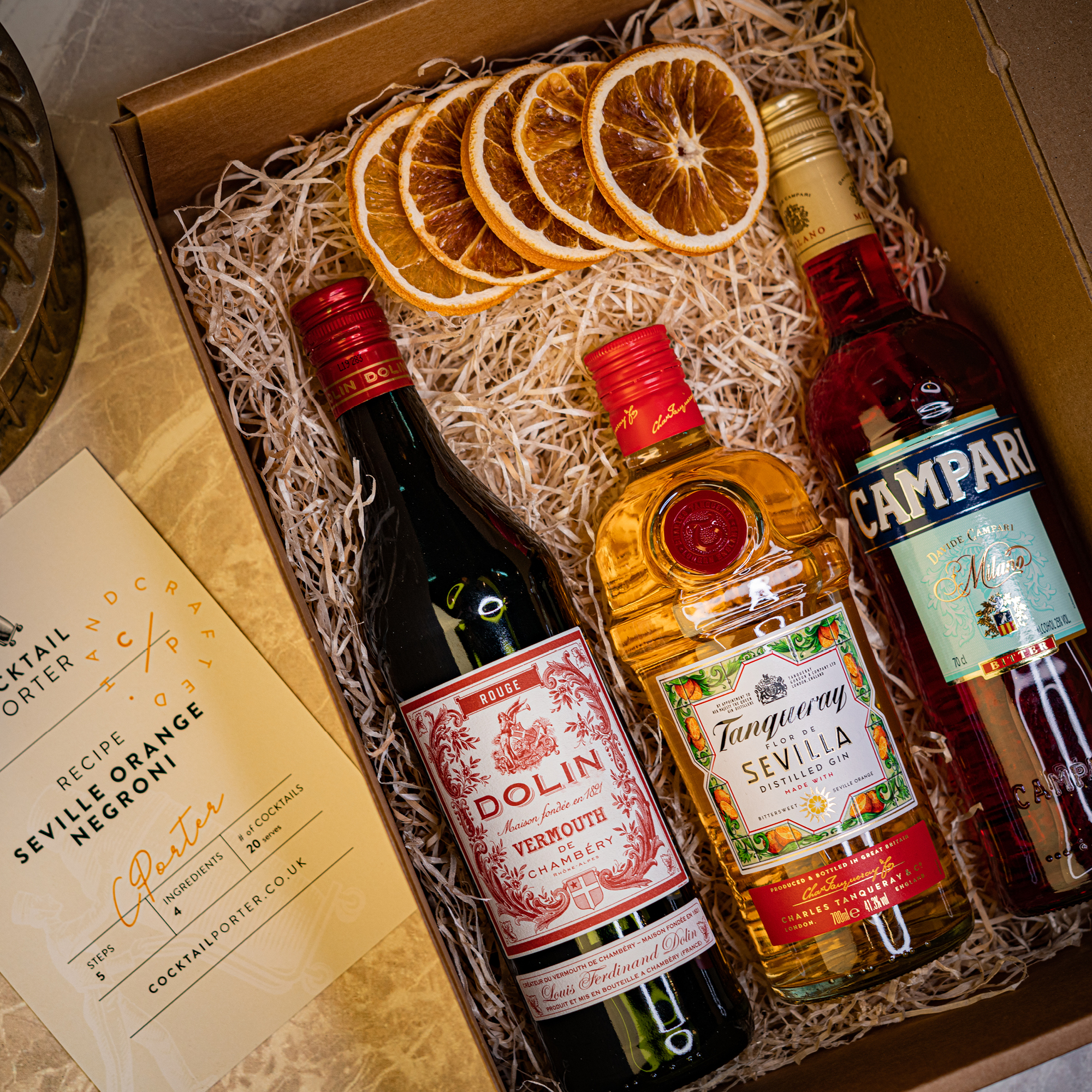 Cocktail Porter's full-size Seville orange negroni box complete with Tanqueray Flor de Sevilla, Campari, sweet vermouth and oranges