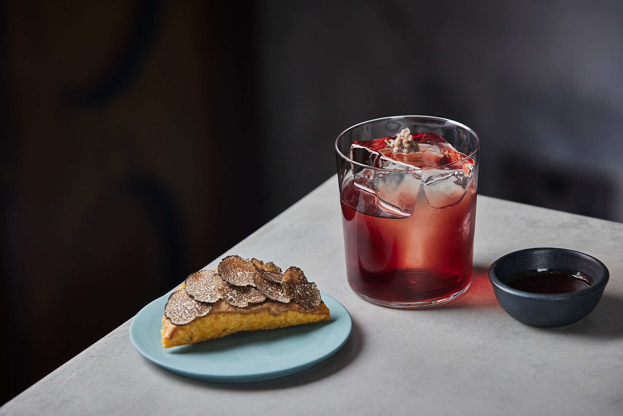 Sloe Grape Mezcal Negroni made with homemade sloe mezcal, Campari, Cocchi Torino sweet vermouth, Bava Uvantica Malvasia, with a pickled yarrow flower garnish. Photograph: Charlie McKay 