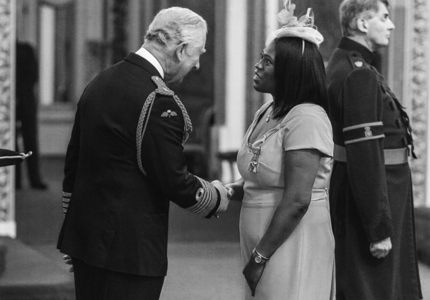 Sabrina Boanu Williams getting her MBE from Prince Charles
