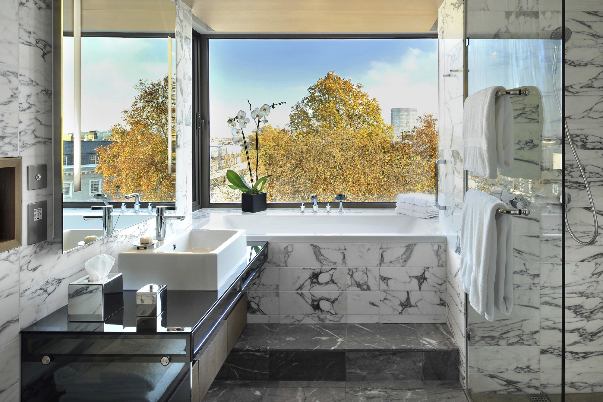 Baths in The Hari's Studio King Suite are irresistible 