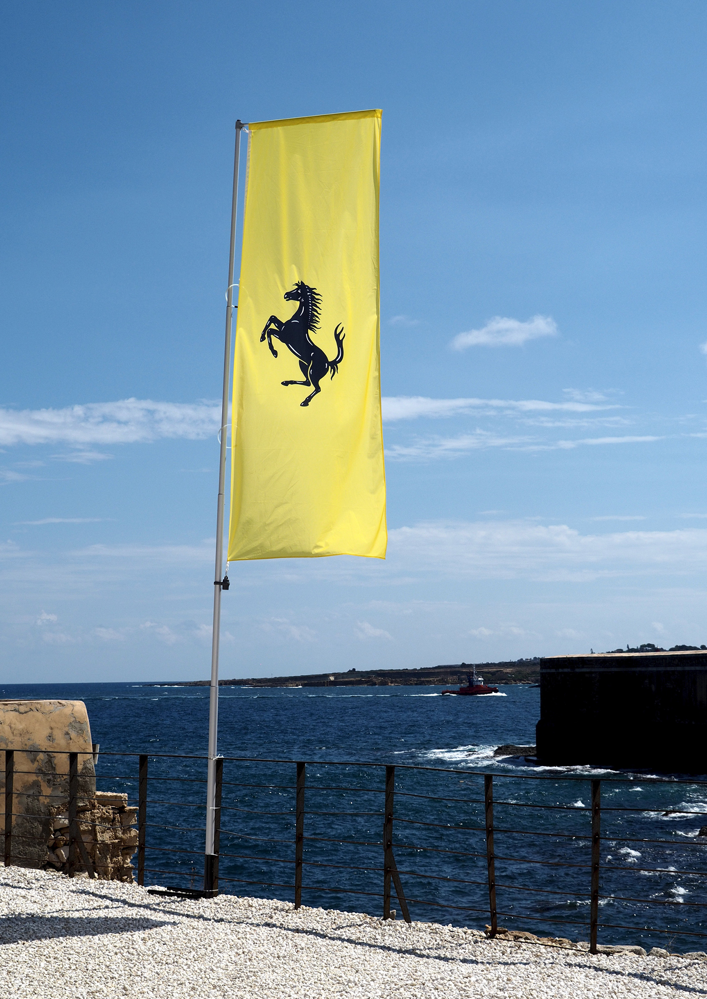 A flag bearing the Ferrari logo flies in its homeland