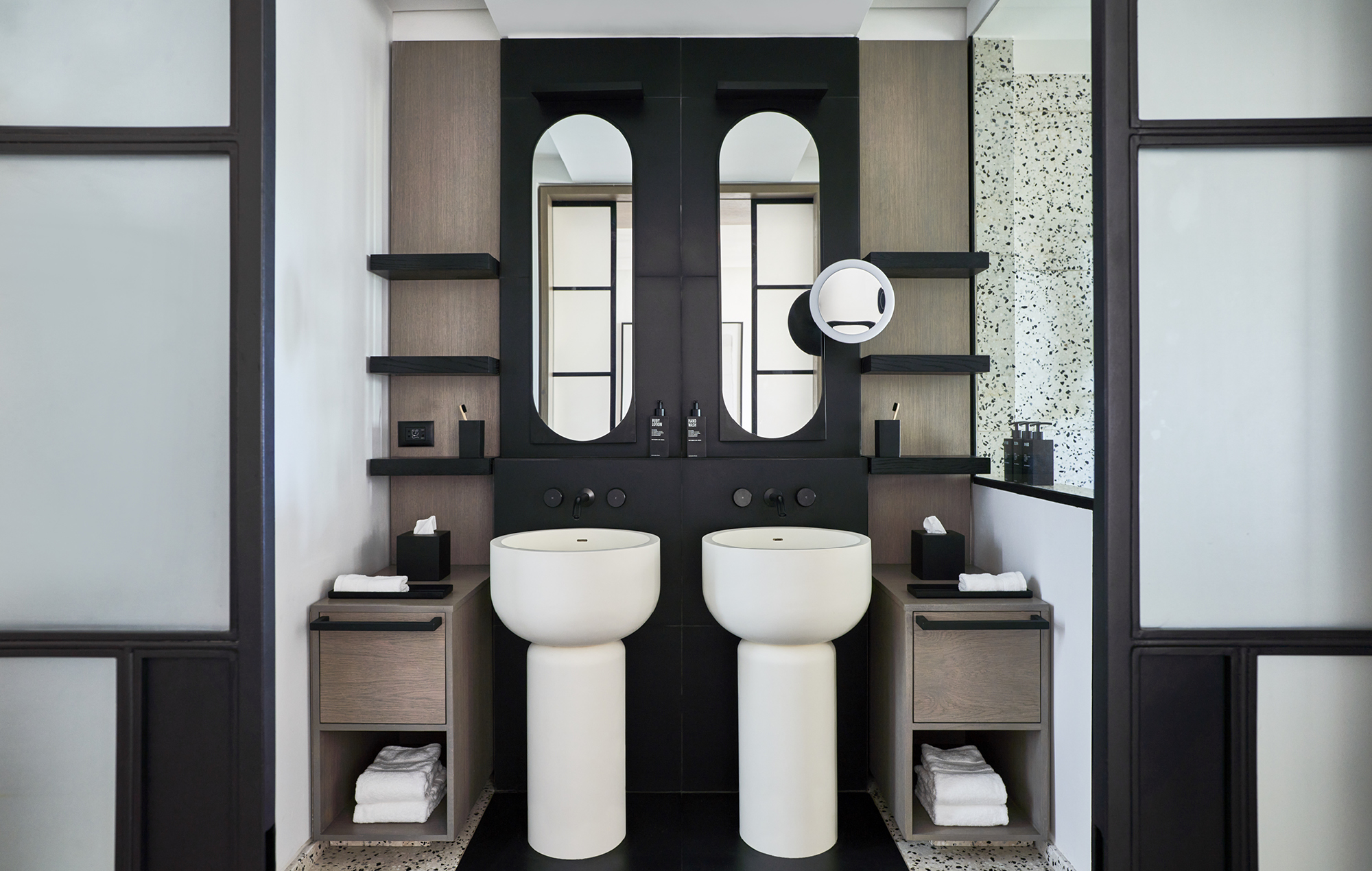 A bathroom at LUX* Grand Baie shows the striking design-led aesthetic of the resort