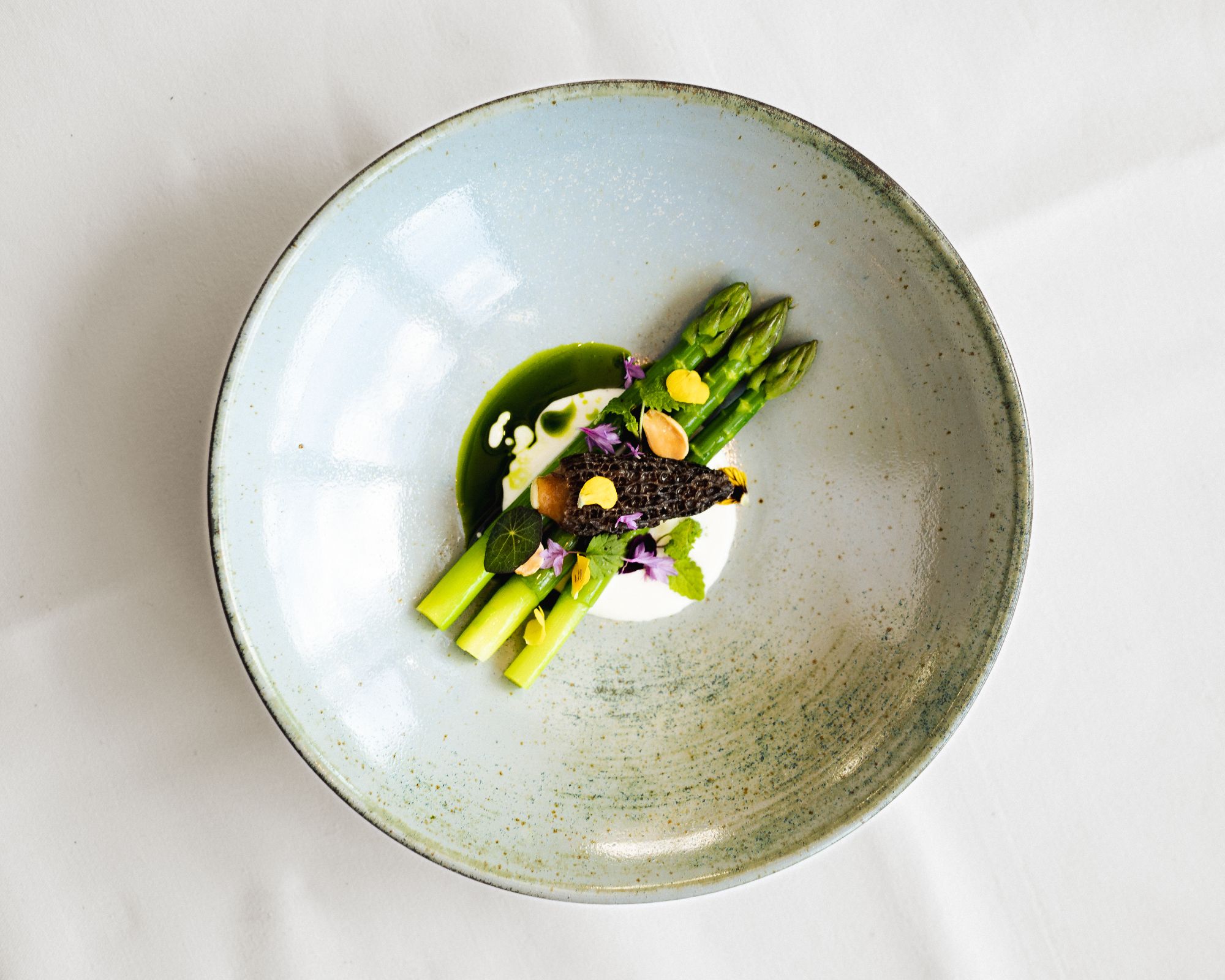 Asparagus, morels and nettles, one of the courses of the Galvin at Windows x Turnips vegan menu