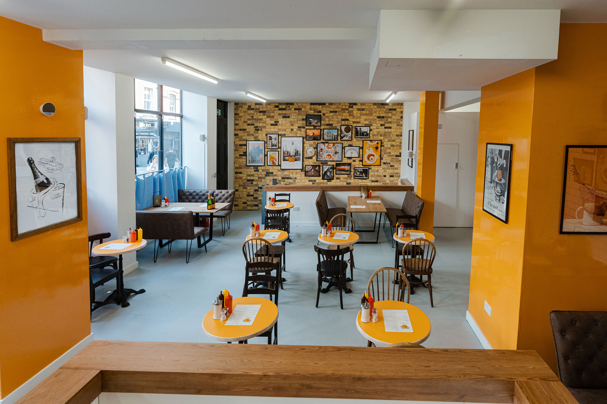 The yellow inflected Sunny Side Up Café by Veuve Clicquot