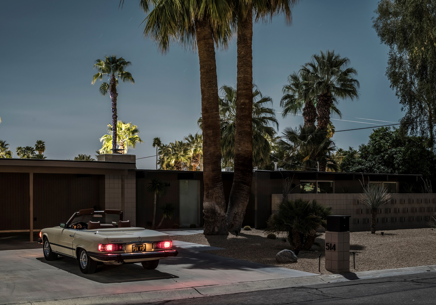 mercedes and mid century house by tom blachford