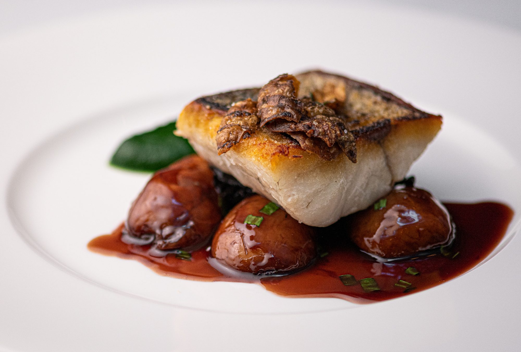 Griddled south coast line caught fillet of seabass, braised jerusalem artichokes, parsley purée, wild mushrooms, red wine and tarragon jus, one of the dishes on the ever-changes menu at Seven Park Place