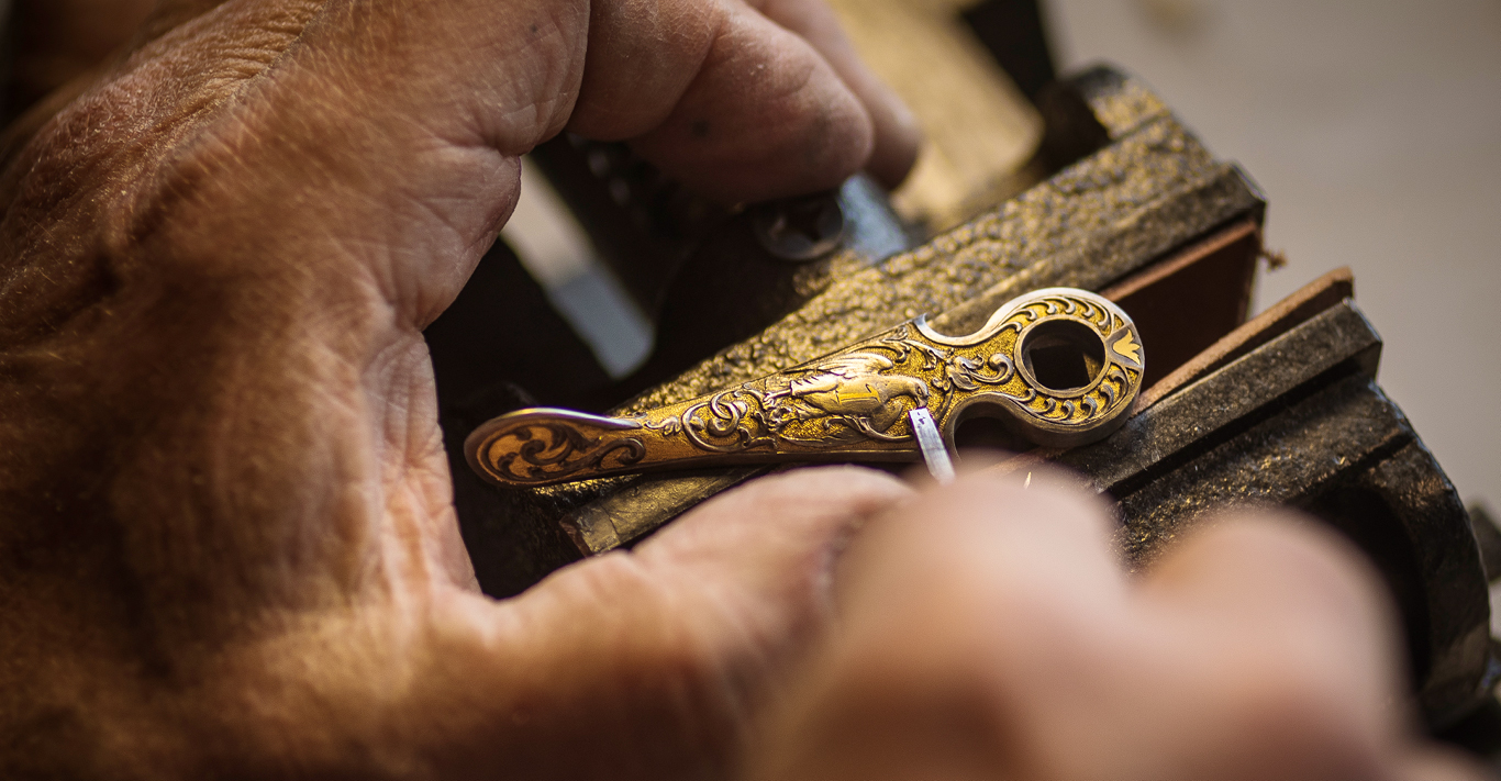A Westley Richards engraver applies a masterful touch to metalwork