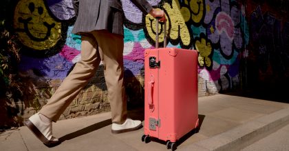 Globe-Trotter’s new large check-in 4-wheel suitcase in Flamingo, £1,695