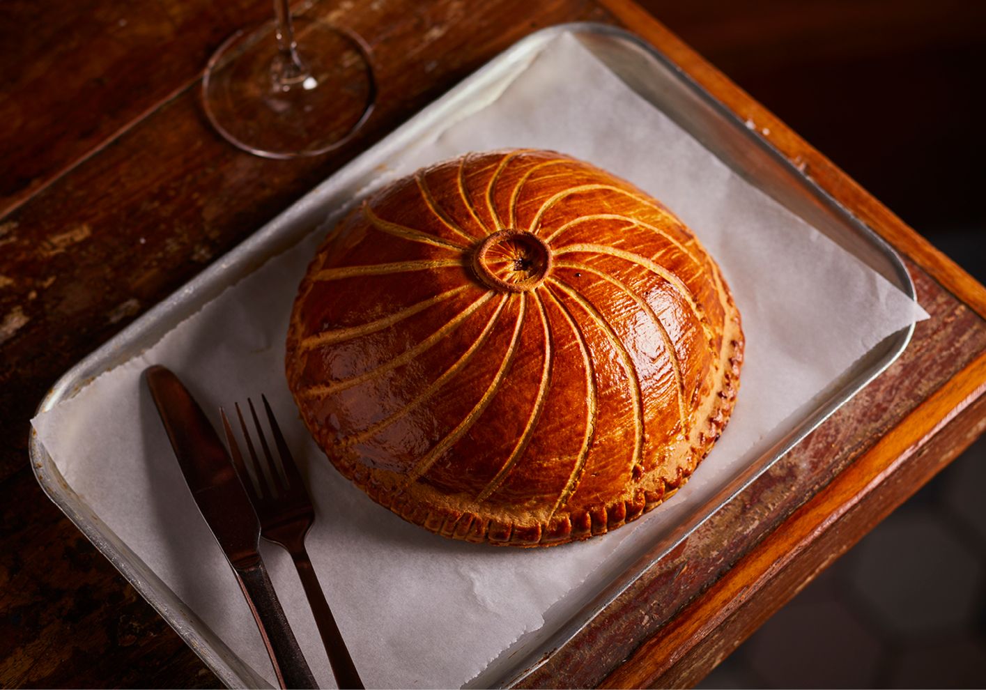 The festive pithivier, filled with duck breast and foie gras, is matched with an old-vintage chianti from the Colli Senesi appellation