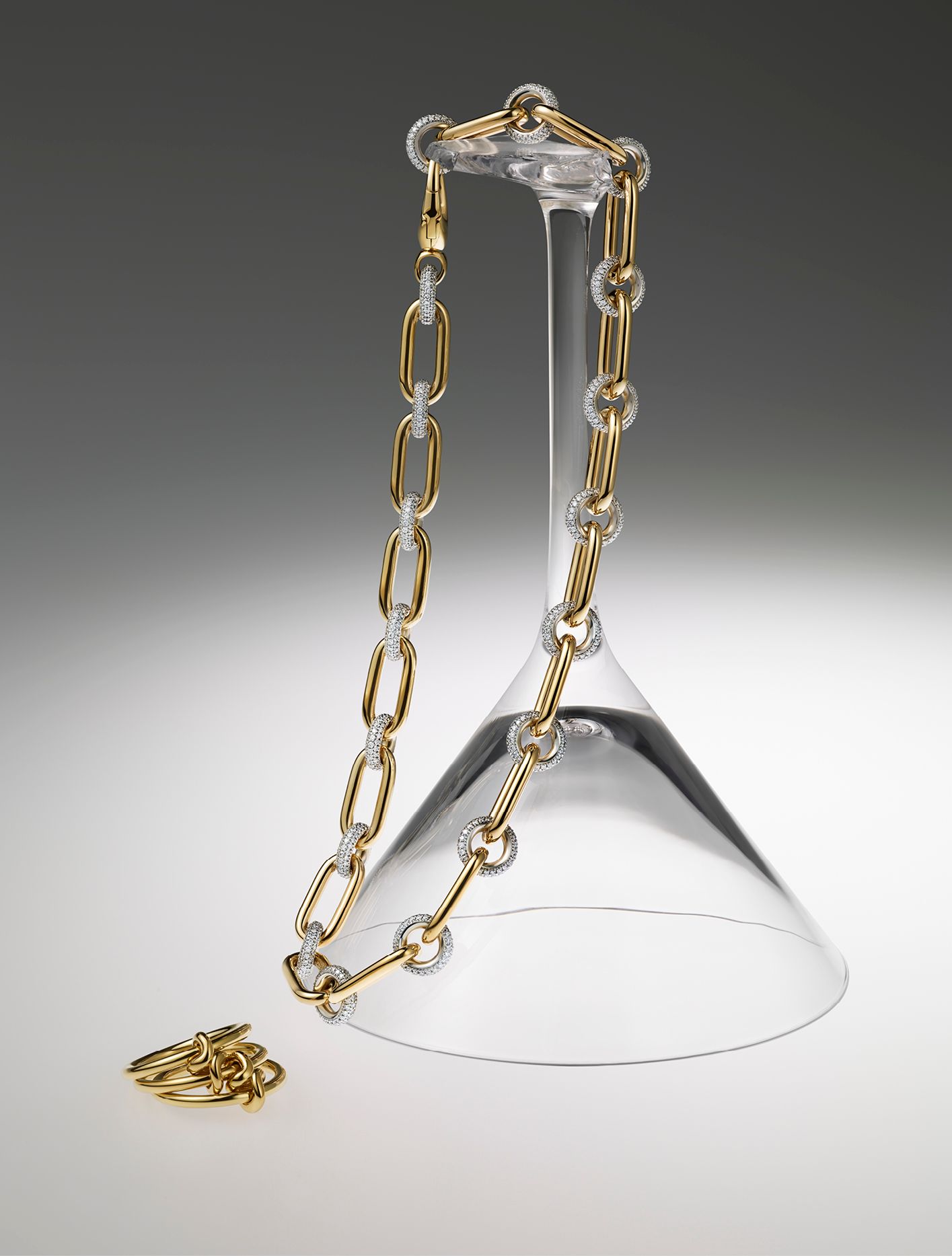 Pragnell Havana 5.4ct diamond chain necklace in 18ct yellow and white gold, £20,600, pragnell.co. uk; Annoushka Knuckle 14ct yellow gold transformable ring, £2,200, annoushka.com