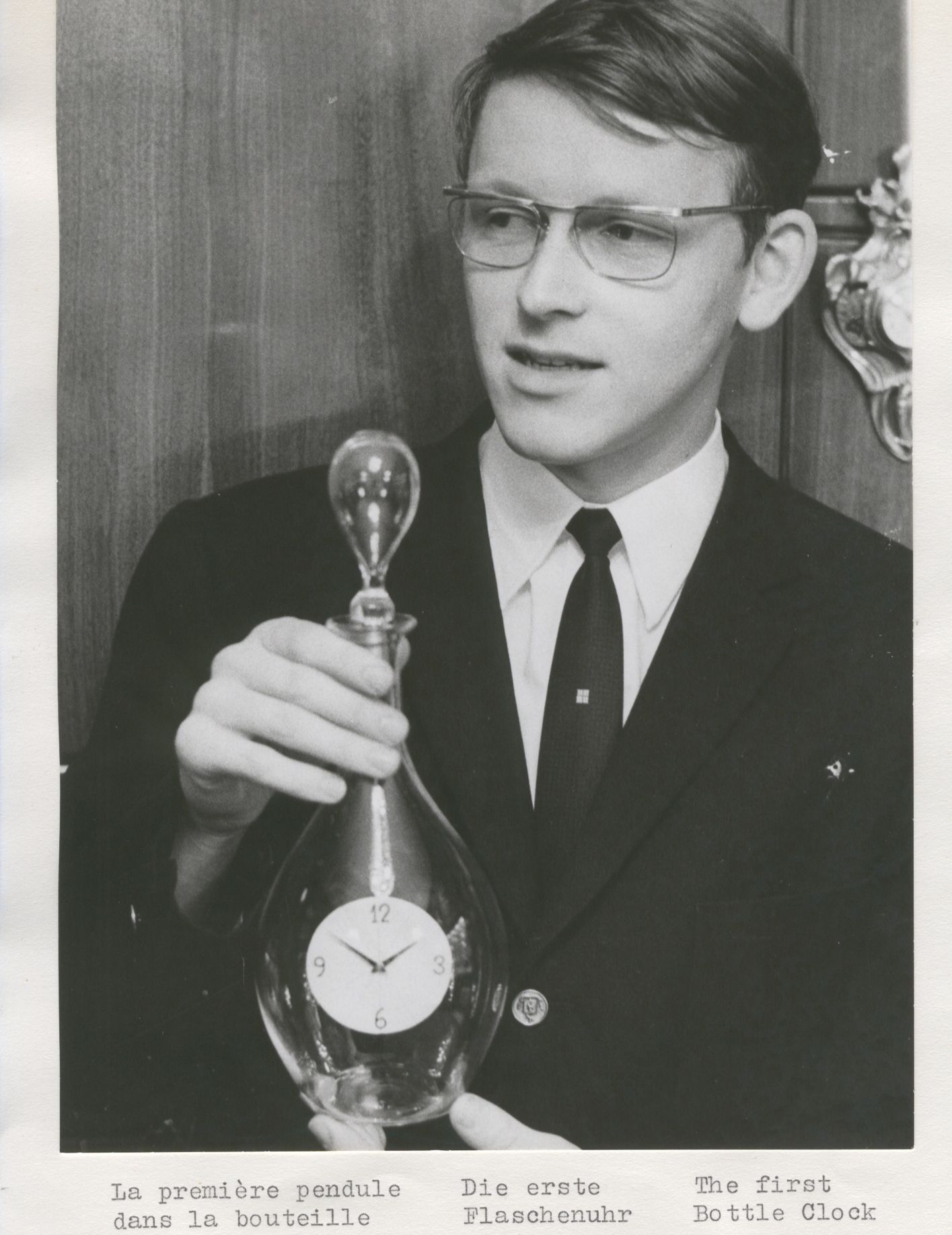 Anderson proudly displays his bottle clock in 1970