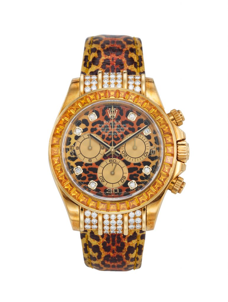 Elton John's watch collection: Rolex Daytona with an orange sapphire-set bezel set and leopard-print dial and strap (circa 2001, £32,000-47,000)