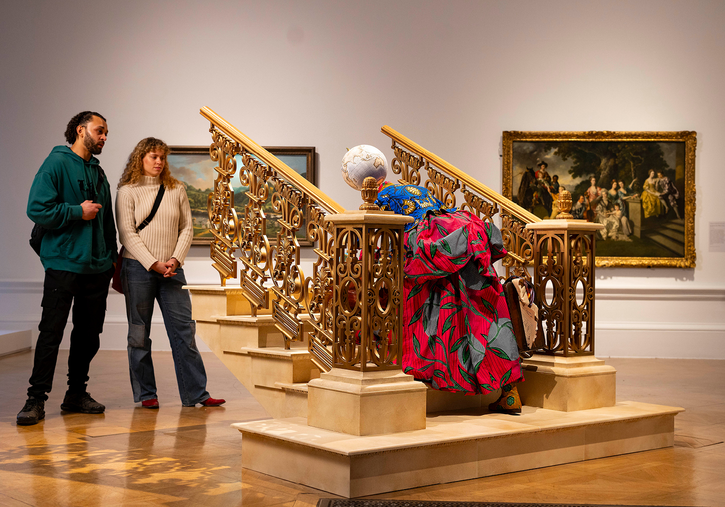 Installation view showing Yinka Shonibare CBE RA, Woman Moving Up, 2023. Courtesy the artist and James Cohan Gallery, New York. Photo © Royal Academy of Arts, London / David Parry. © Yinka Shonibare CBE RA
