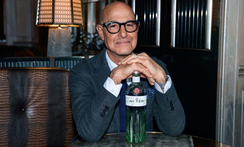 Actor Stanley Tucci with a bottle of Tanqueray Nº Ten