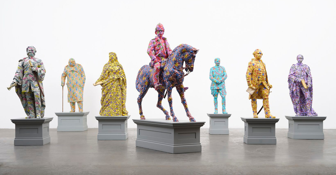 Yinka Shonibare CBE, Decolonised Structures, 2022-23. Fibreglass sculptures, hand-painted with Dutch wax pattern, gold leaf and wooden plinths.