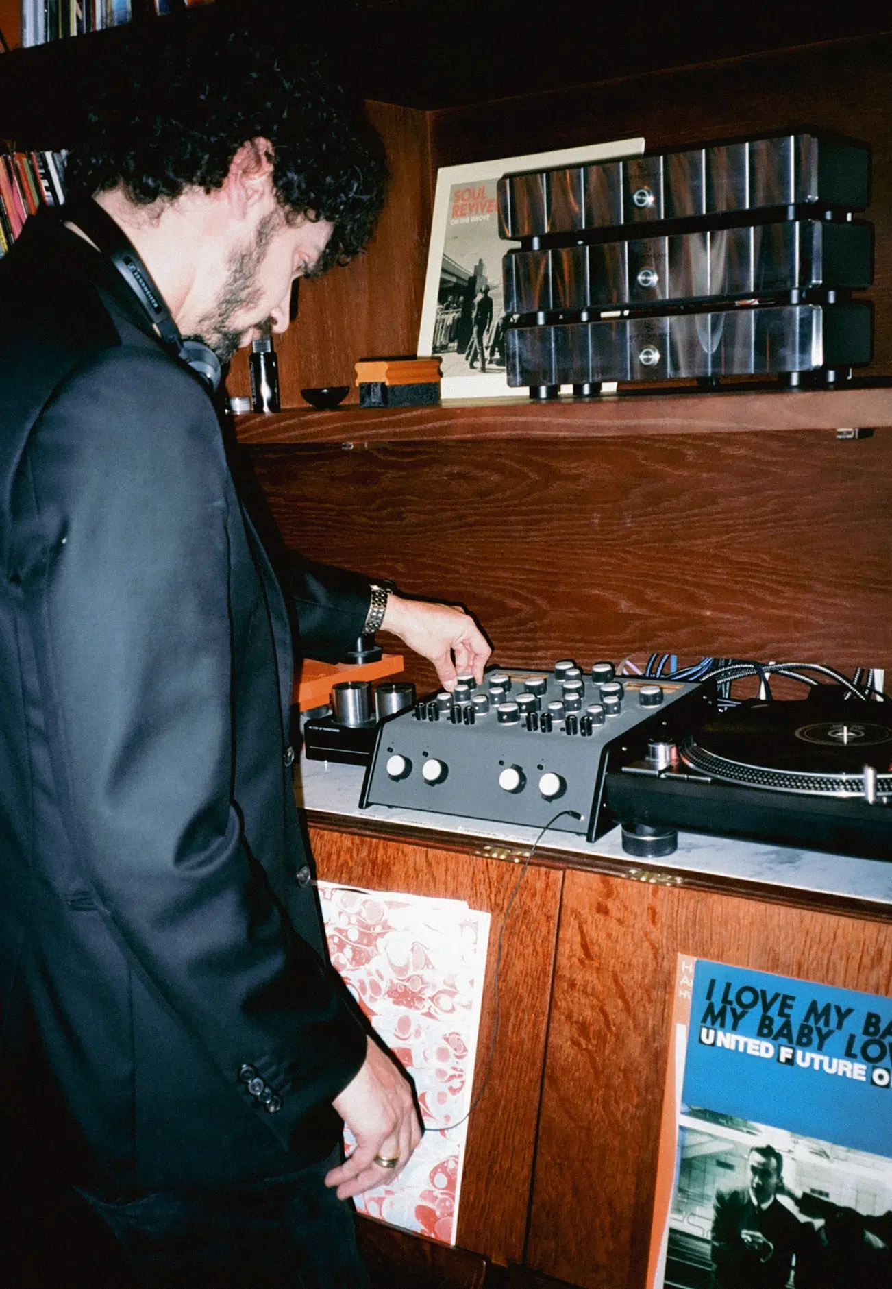 A film photograph of a vinyl DJ at Caia
