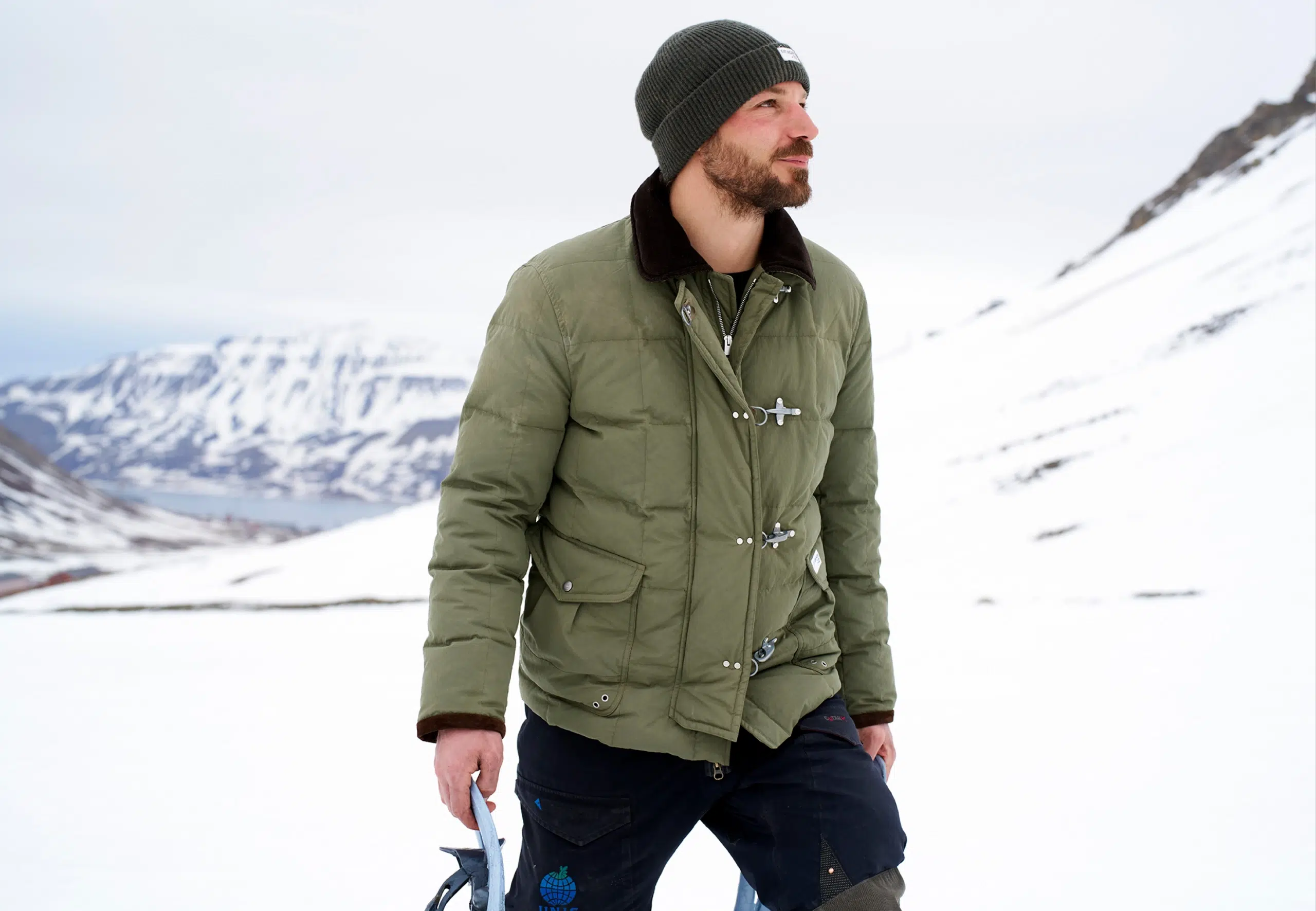 Man wearing Faye jacket in Norwegian glacier