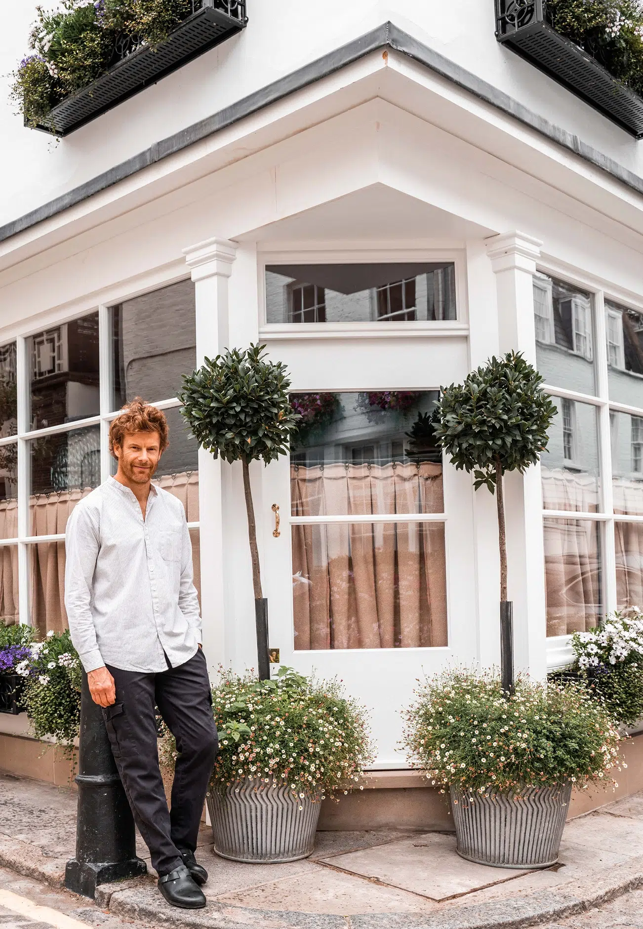 Chef, Tom Aikens outside Muse