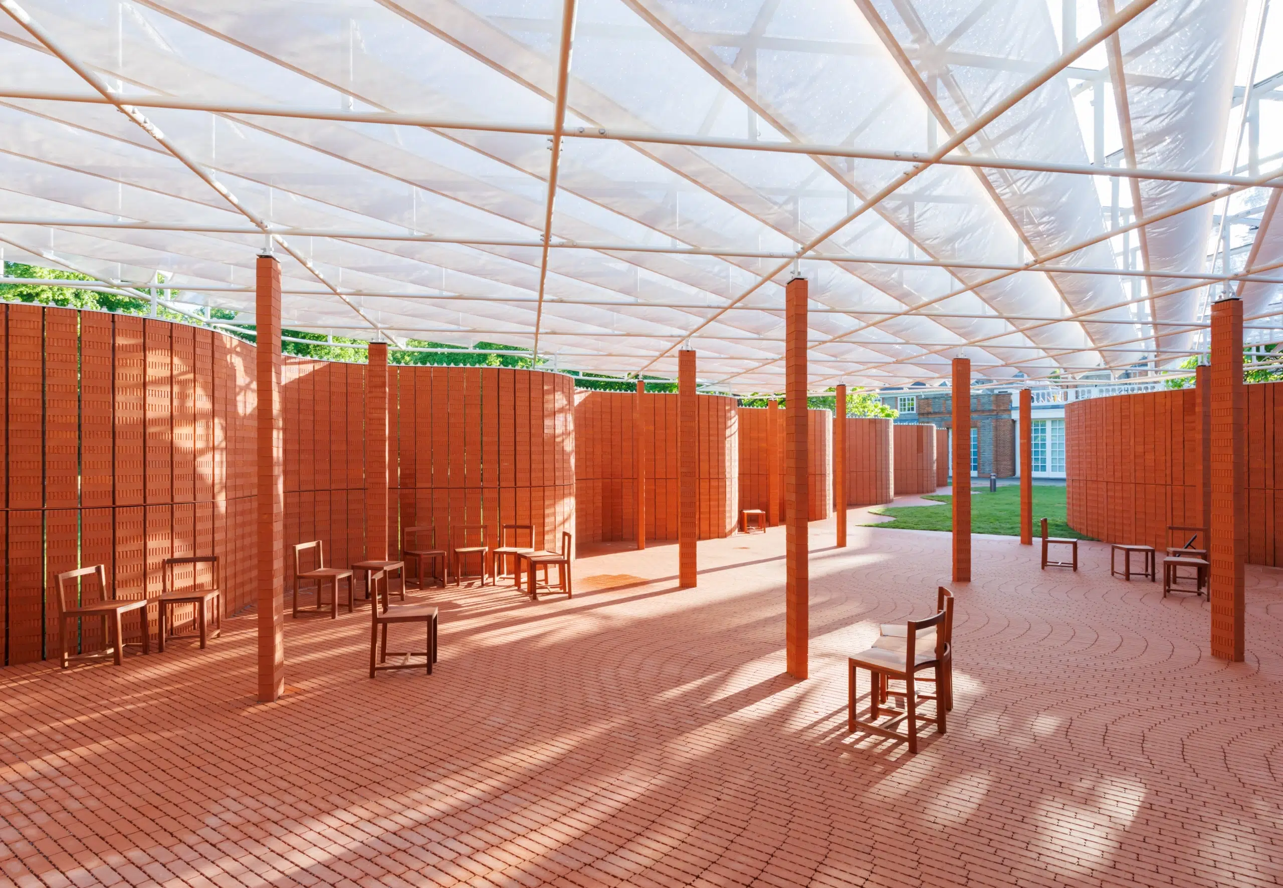A pavilion made of brick and glass